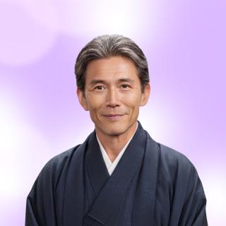 成の顔写真